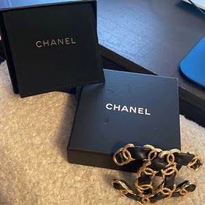 Black and gold Chanel brooch